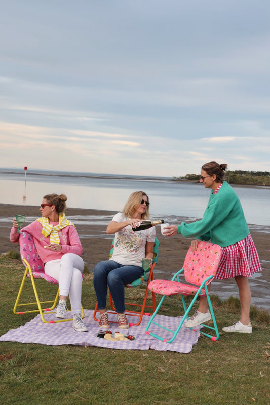 Portable folding chair for the beach