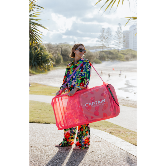 Outdoor folding chair with pink carry bag
