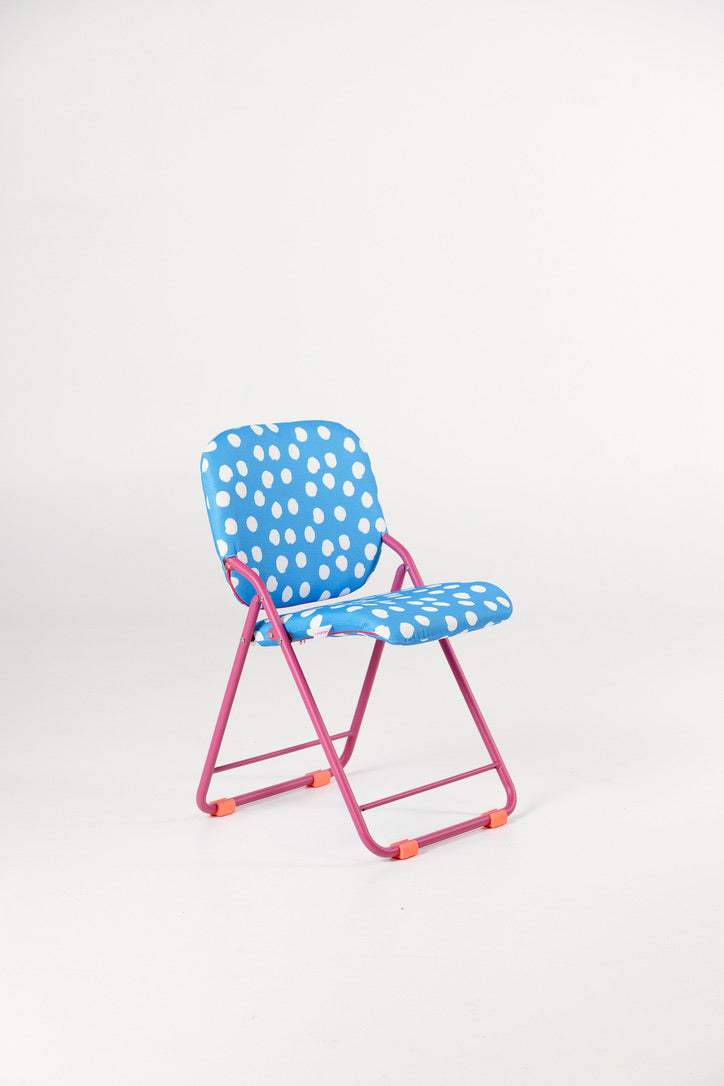 Best Chair in Australia with blue polka dot seat and pink frame on a white background