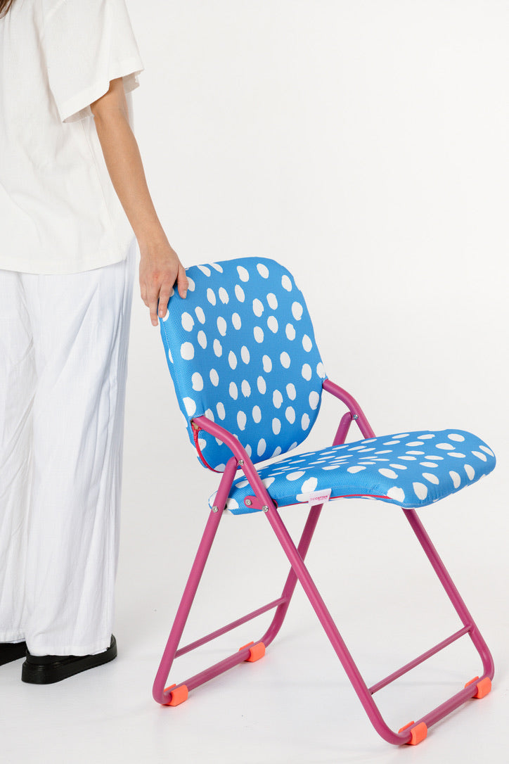Blue and white folding chair indoors and outdoors Australia 